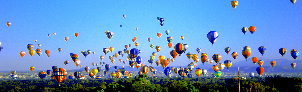 Mass ascension of hot air balloons over Albuquerque Fiesta
